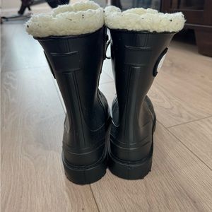 Black winter water resistant boots with fur lineing. Very cute!